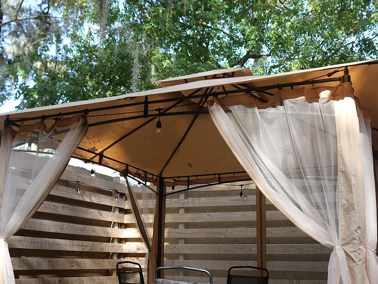 Amazing shaded area under the trees to enjoy a morning cup of coffee or hang out at with friends