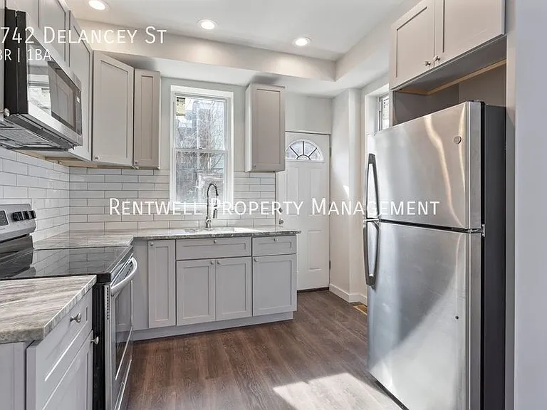 5742 Delancey St — Photo 6