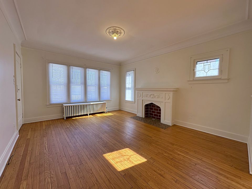Large Living room with elegant (for decoration only) fireplace.