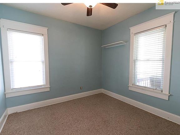 Bedroom 1, there are hardwoods under the carpet.
