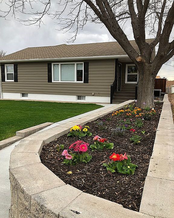 Home with flower bed