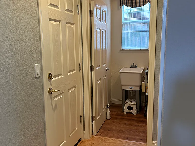 Hallway to Garage & Laundry Room