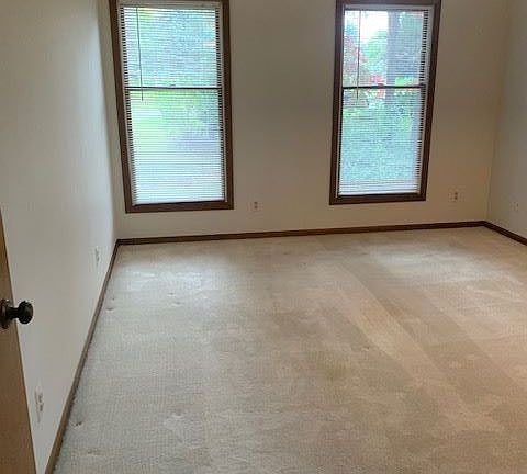 Bedroom 1 with lots of natural lighting.