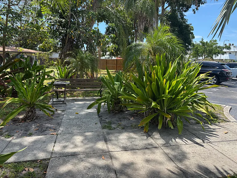 Beautiful landscaping throughout complex.