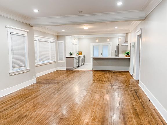 Living room/dining space and kitchen (view from front door)