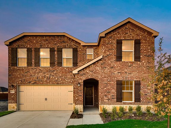 The Thomaston, a two-story home with shutters, shown with Home Exterior E