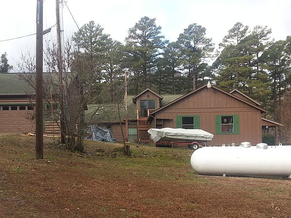 2-1000 gal tanks + workshop