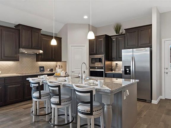 All Photos shown here may not depict the specified home & features included are for illustration purposes only