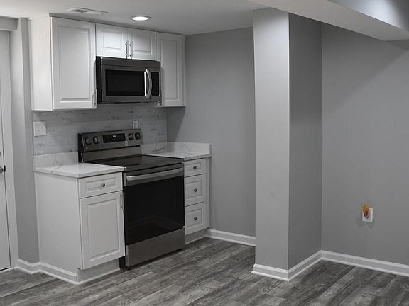 Shared kitchen. All new quartz counters and stainless steel appliances.