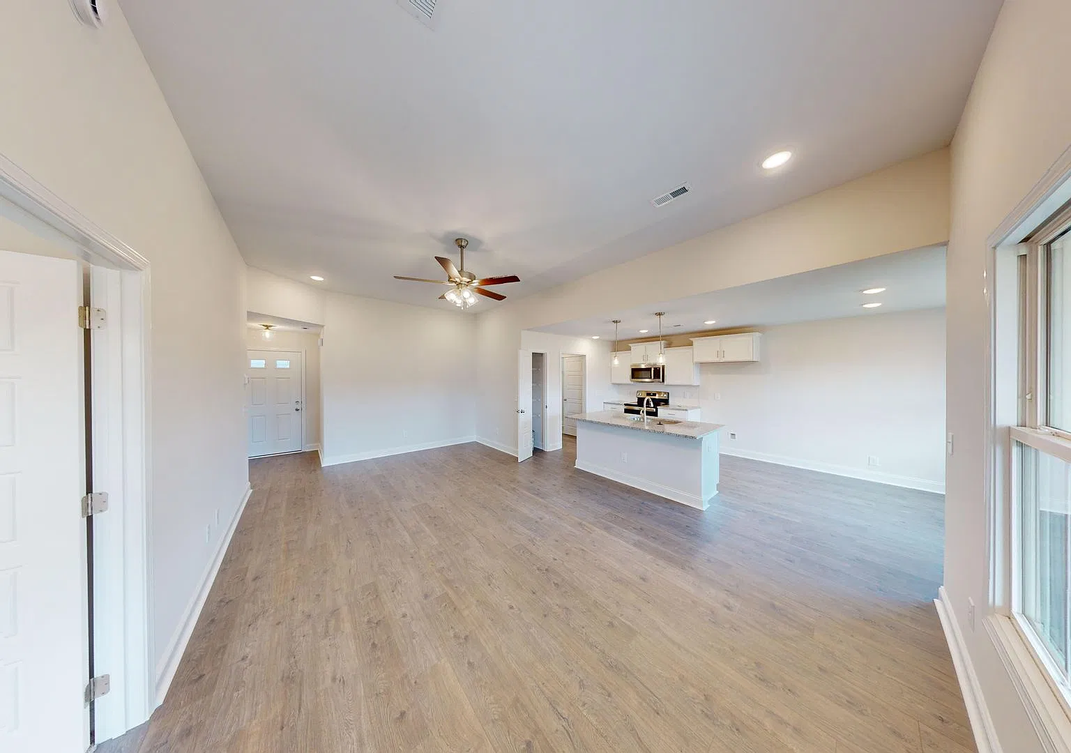 Stylish Home with Large Kitchen Island, Open Layout, and Premium Upgrades — Photo 3