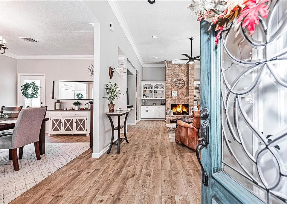 Enter into a open concept entry that leads into the formal dinning and living space