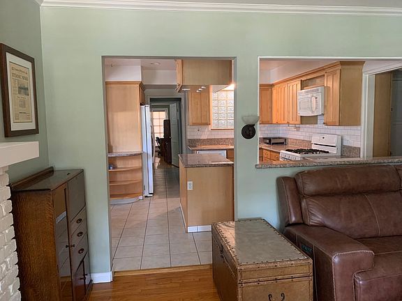 Living room with view of kitchen