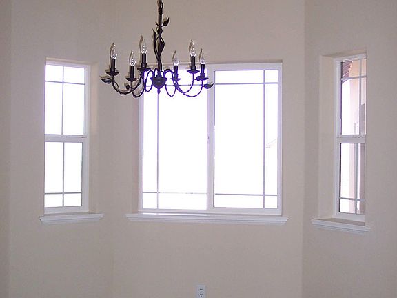 Not only does this have a kitchen nook, but also this beautiful dining room.