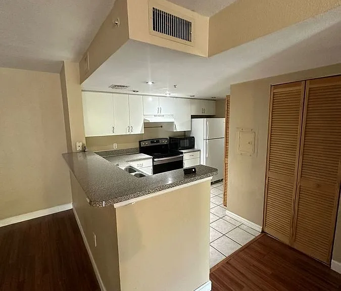 5035 Wiles Rd #203 — Photo 29