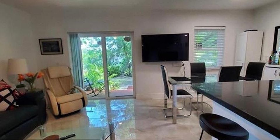 Living/dining with water views.