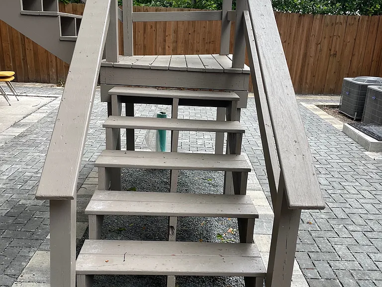 Stairs leading to the home which is on second level