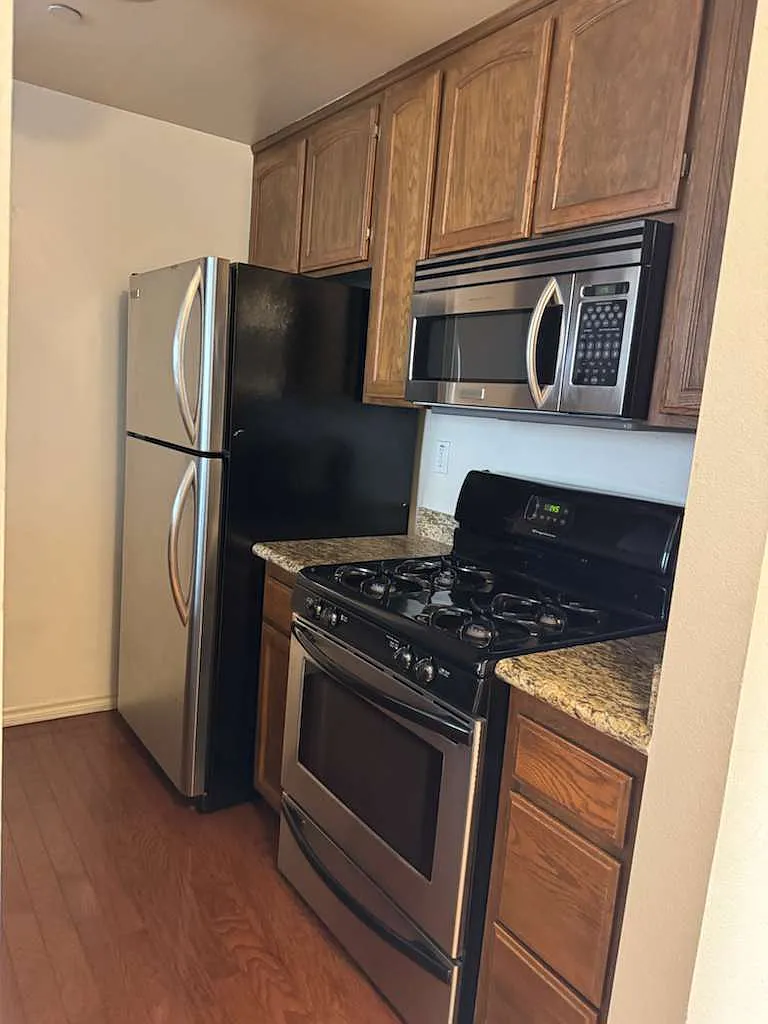 Building Photo - 4523 Woodman Ave #106