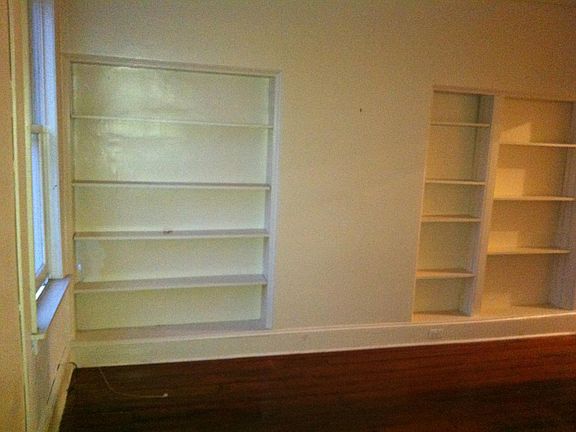 Built-in bookshelves in bedroom
