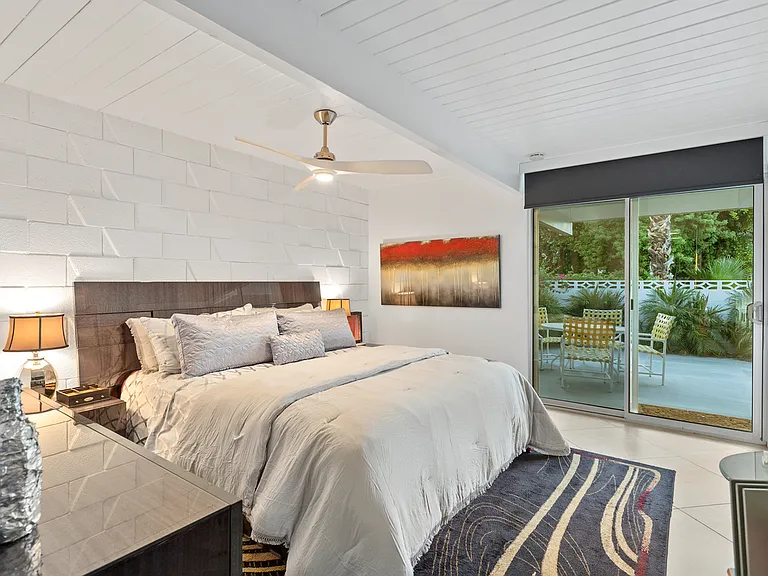 The Master Bedroom overlooks a private patio.