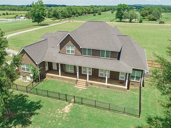 Covered Porch on this ALL BRICK HOME!