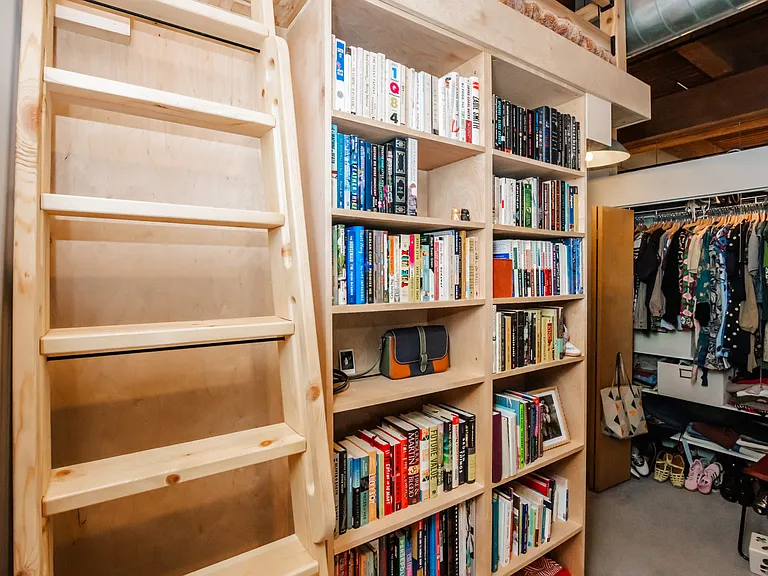 Ladder to loft sleeping area.
