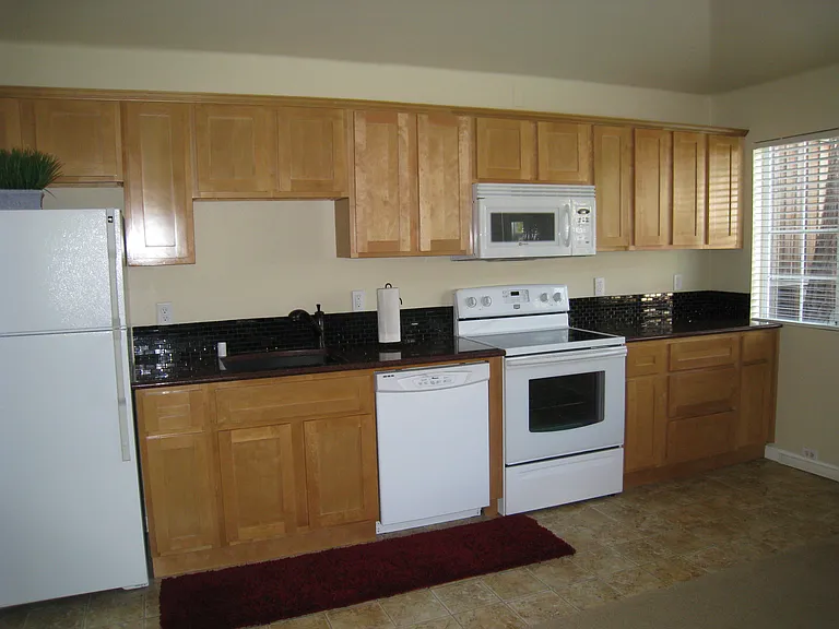 Full kitchen with new laminate flooring (not shown)