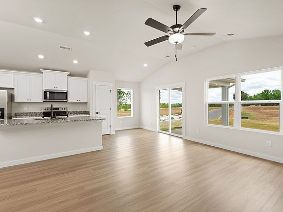 The kitchen overlooks the dining area