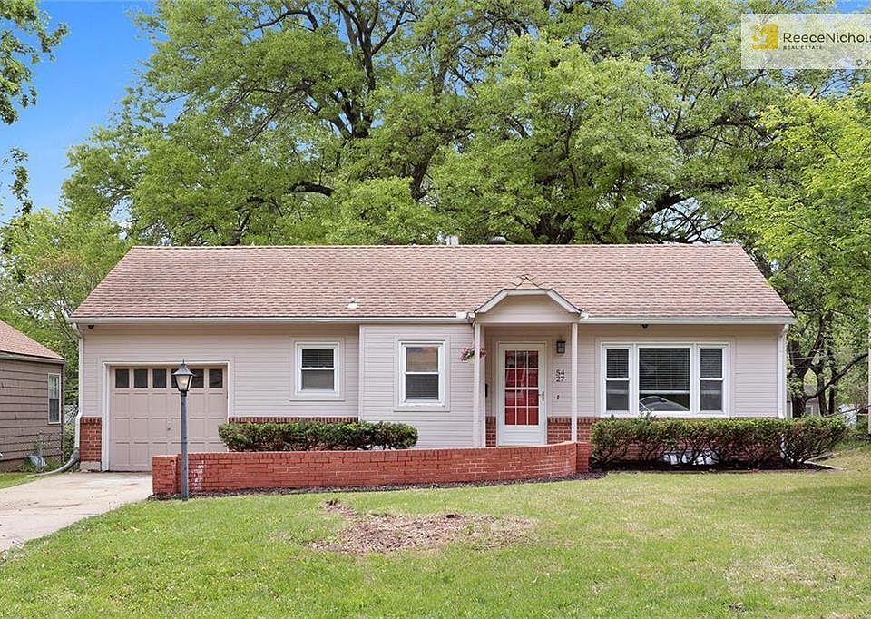 Welcome home to this charming 2 bed, 1 bath ranch with attached garage in the heart of Roeland Park!