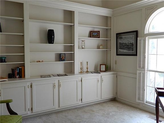 Study is directly off the entry foyer and is well appointed with built-ins,