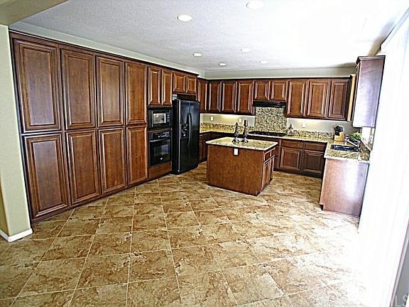 Tons of cabinets! Breakfast nook area!