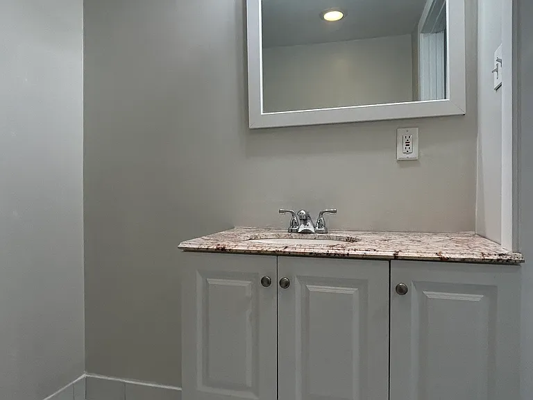 Renovated bathroom gorgeous granite top vanity