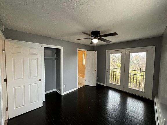 Bedroom 1 with double door for plenty of light and access to bathroom as well as two large closets
