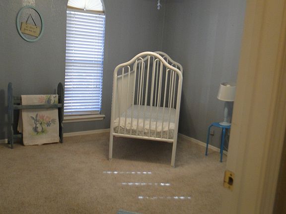 one of three bedrooms