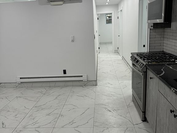 3rd image of 6080 Catalpa Ave Floor Basement