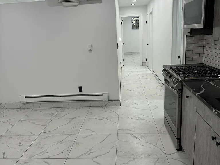 6080 Catalpa Ave #BASEMENT — Photo 3