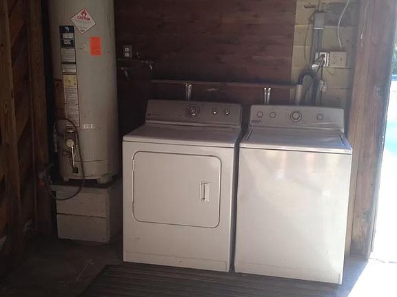 Garage with washer and dryer.