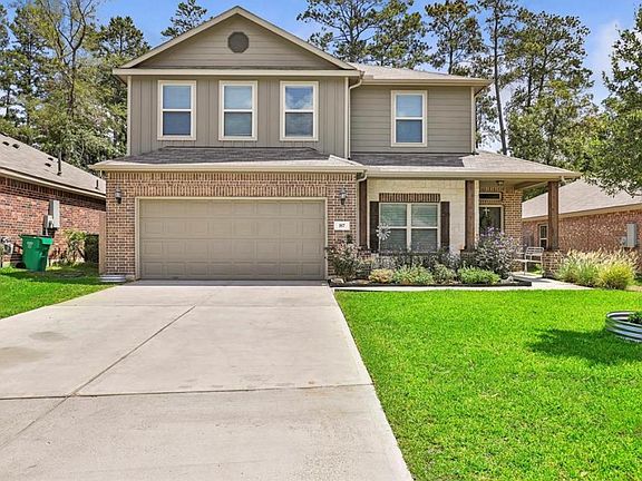 TWO CAR GARAGE & AN INVITING COLOR PALETTE...