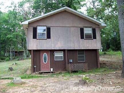 82 Tall Timbers
						:
						Block and siding construction.
