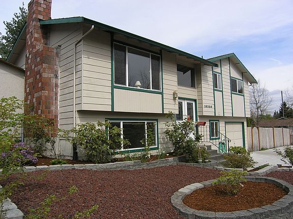 Drought-resistant plantings mean a low maintenance yard! Very little work here
