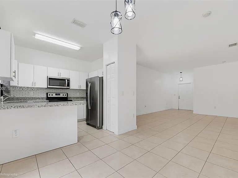 2630 NE 3rd Dr — Photo 12