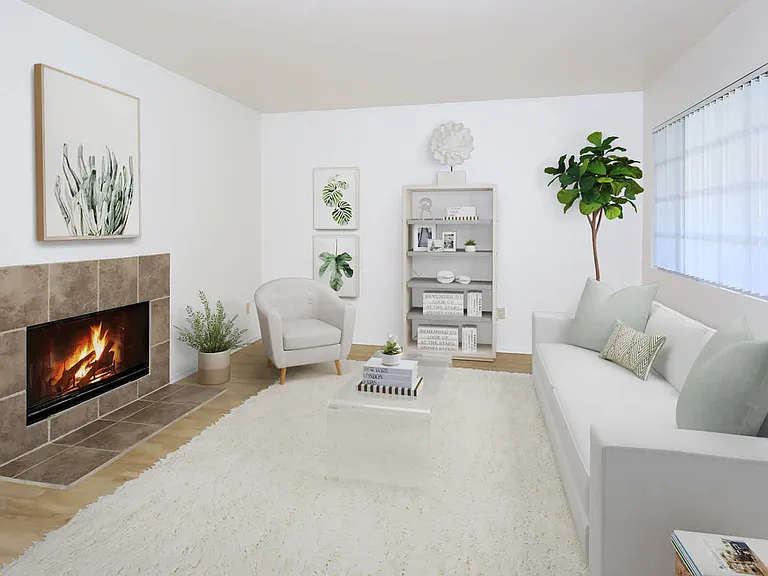 Carpeted Living Room with Wood-burning Fireplace