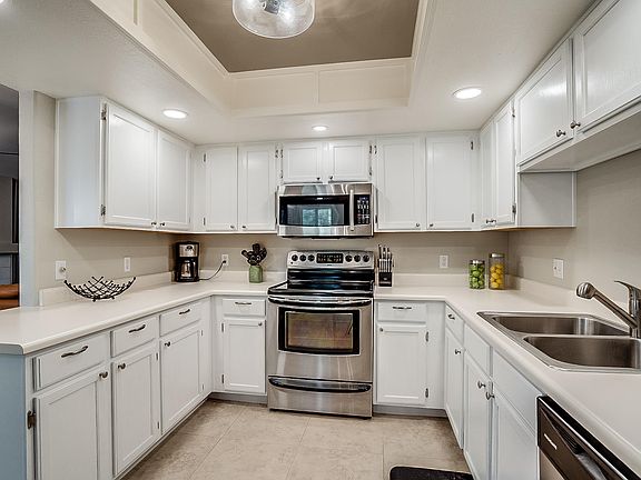 5th image of 9775 N 94th Pl Unit 202