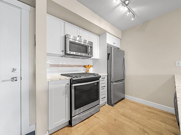 2nd image of 4815 55b St #208