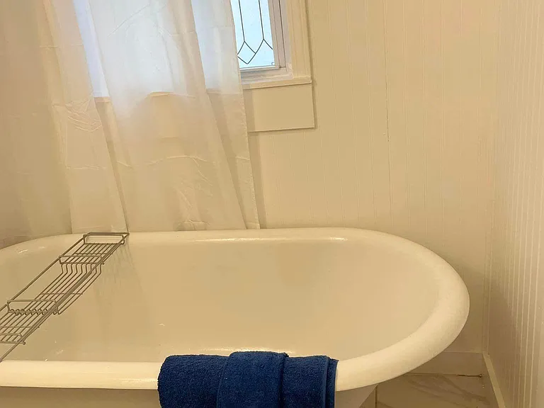 clawfoot tub frosted window shower curtain