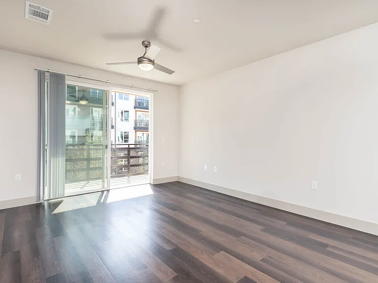 Living Room with Balcony and Hard Surface Flooring