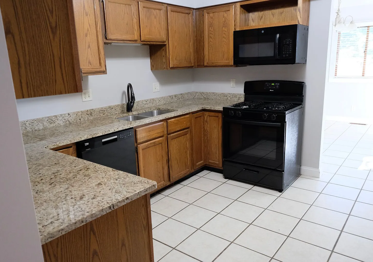 Must see in person! Well maintained 3 Bed 2.5 bath condo in a very quiet location. 2 car detached... — Photo 2