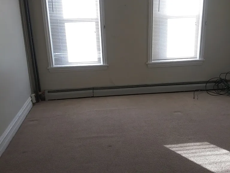 First floor bedroom facing street