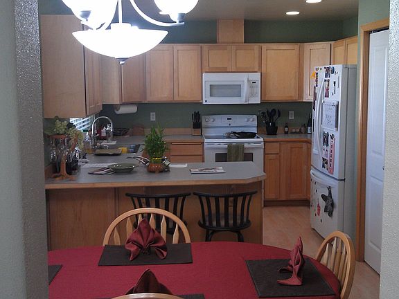 View into the dining room and kitchen.