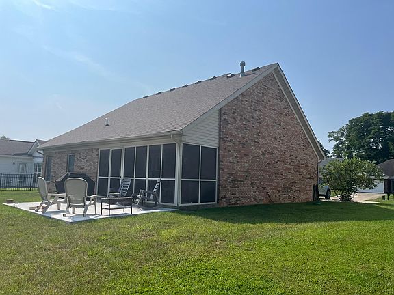 You will enjoy the screen in porch, concrete patio, and back yard.