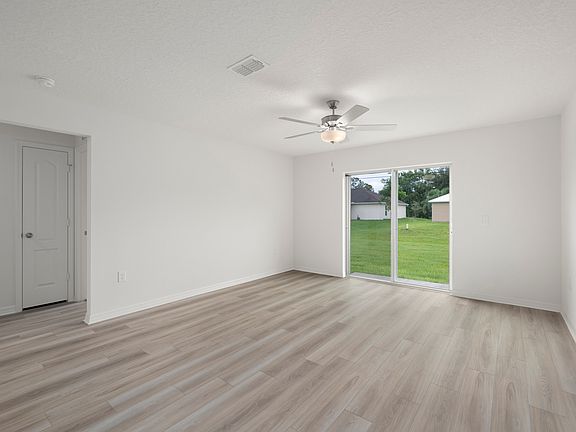 The family room is spacious and opens up easily to the dining room